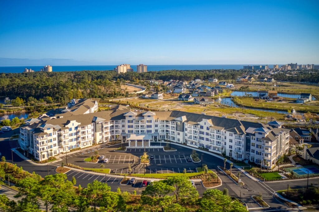 Exterior aerial view of Portside at Grande Dunes, a senior living community near Conway, SC.